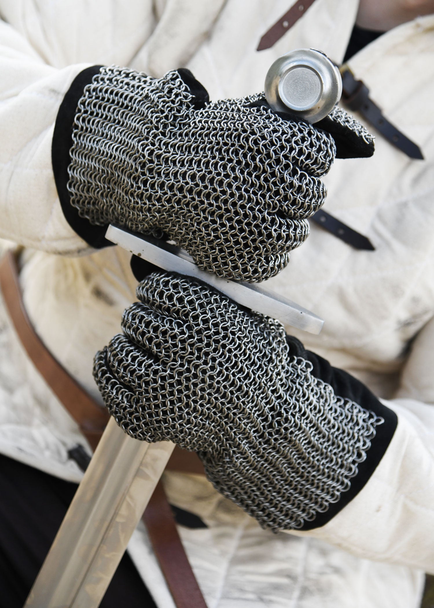 Leather gloves with chainmail on the back