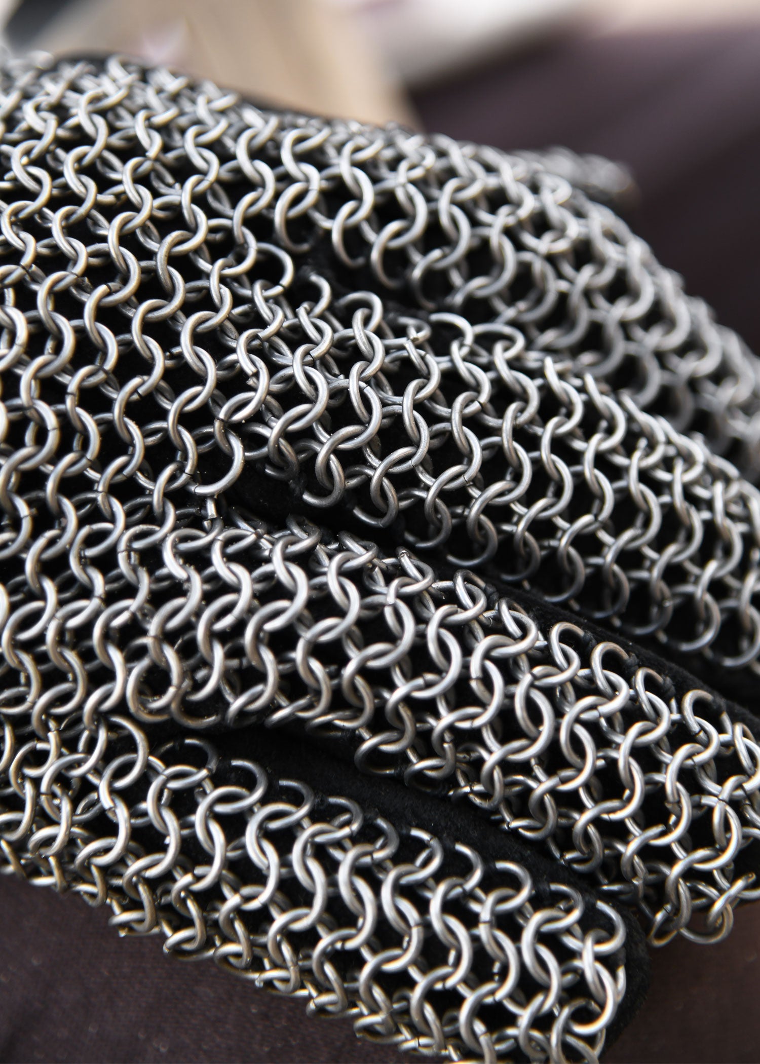 Leather gloves with chainmail on the back