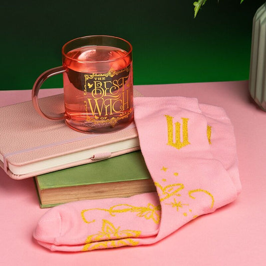 Imagen de Set Taza De Cristal + Calcetines Glinda Wicked parte de nuestra colección en Espadas y más, sitio oficial.
