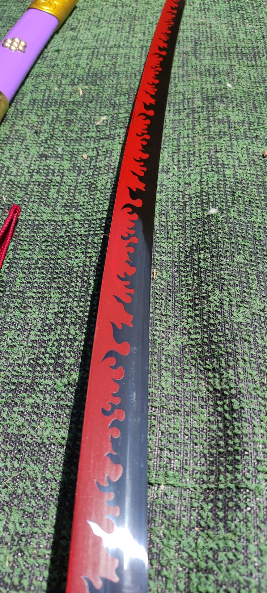 Imagen de Katana Enma funcional de Zoro de One piece morada parte de nuestra colección en Espadas y más, sitio oficial.