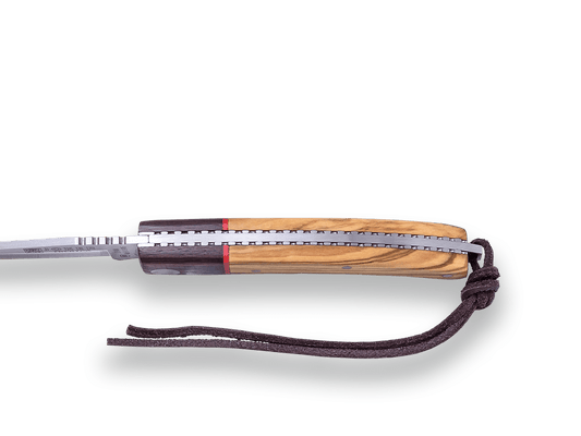 NAVAJA DEPORTIVA JOKER IBÉRICA ,DE PISTON, CACHAS EN MADERA DE OLIVO, ACERO INOX MOVA 1.4116 Y HOJA DE 7,5 CM. - Espadas y Más