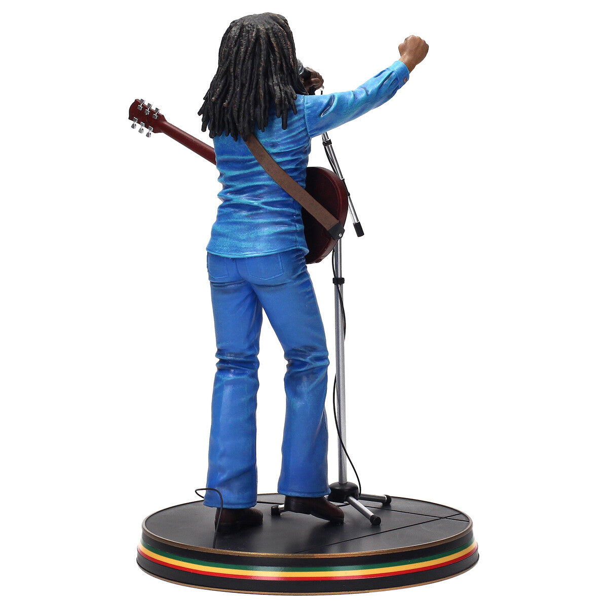 Figura Bob Marley - foto de ambiente con iluminación de escenario naranja