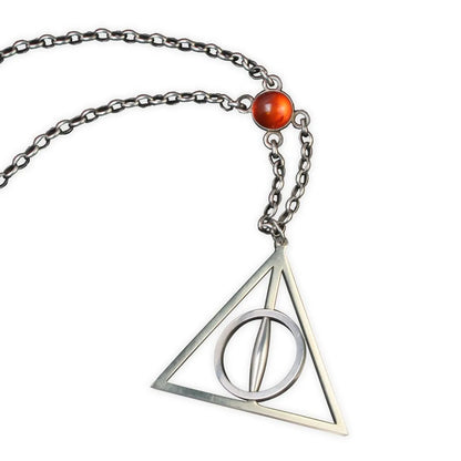Colgante y expositor las reliquias de la muerte Harry Potter