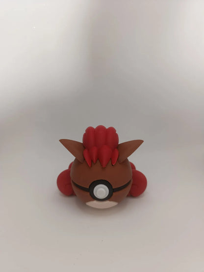 Réplica colecionável do Vulpix na Pokébola