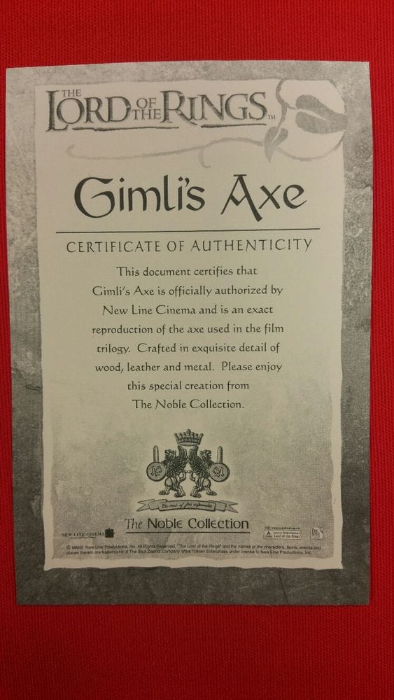 Certificado de autenticidad del Hacha de combate de Gimli de El Señor de los Anillos de The Noble Collection. Vendida por Espadas y más